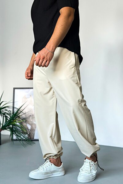 LUVEST ERKEK STOPER PAÇA PARAŞÜT KUMAŞ BAGGY KALIP BELİ LASTİKLİ KREM PANTOLON