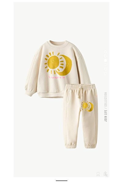 anonim طقم سويت شيرت بنقشة القمر والشمس