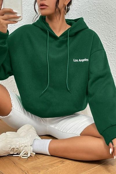 MODAGEN Zelená dámská oversize mikina s kapucí a potiskem Little Los Angeles