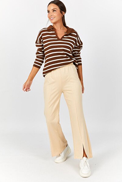 armonika Жіночі бежеві широкі штани з передньою строчкою та розрізом на рукав...