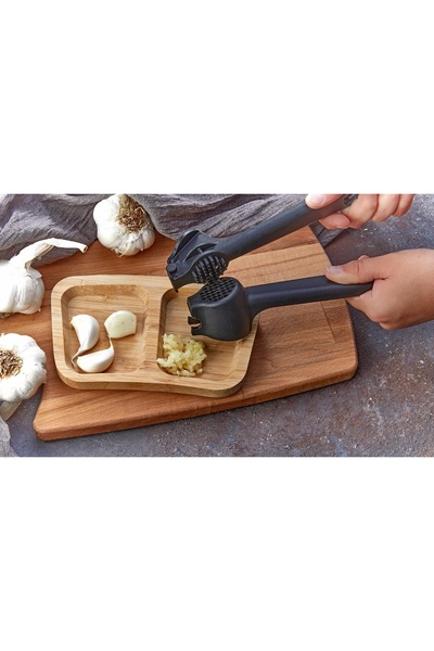 Tanemce هراسة الثوم السوداء ومكبس الثوم من البلاستيك الصلب العملي سهل التنظيف