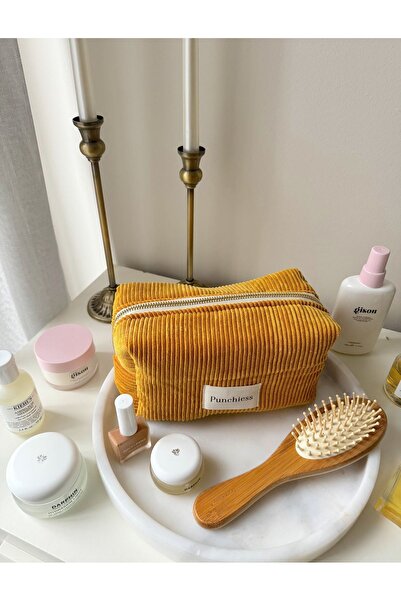 Punchiess حقيبة مكياج مخملية بلون الخردل