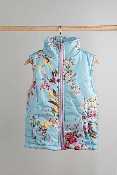 MAİBELLA Blue Patterned Zippered Stand Collar Girl's Puffer Vest |   Pocket Detail – Stylish and Functional