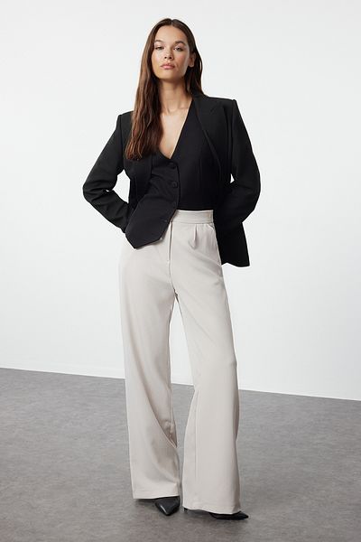 Trendyol Collection Beigefarbene gewebte Hose mit weitem Bein – TWOAW22PL0139