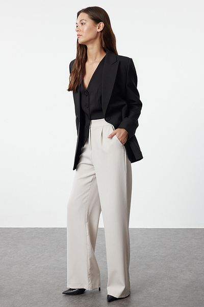 Trendyol Collection Beigefarbene gewebte Hose mit weitem Bein – TWOAW22PL0139