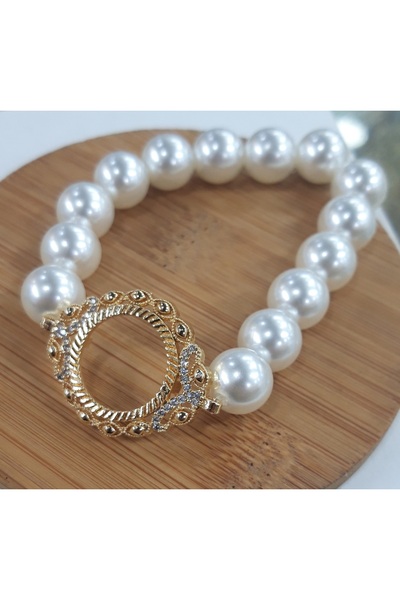 Nurtakı ربع الخرز وسوار اللؤلؤ