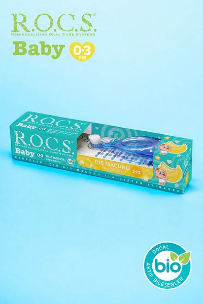 R.O.C.S. معجون أسنان روكس بيبي 0-3 سنوات بطعم الموز الهريس 45 جم + مجموعة فرشاة أسنان باللون الأزرق