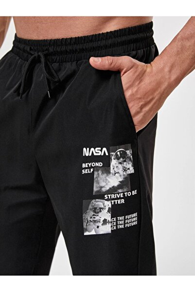 Mythologie Чоловічі штани Nasa Beyond Self Jogger - Чорні з принтом на гумці та високою талією