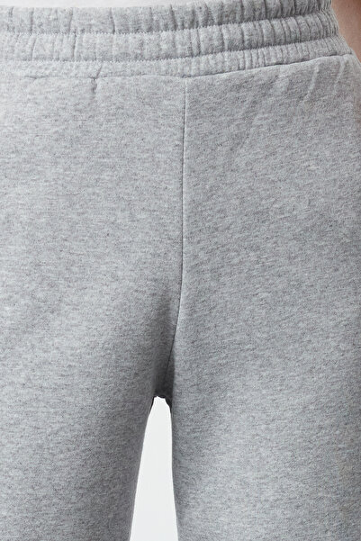 Trendyol Collection Γκρι μελανζ Χαλαρή κοπή τσέπη Χοντρό κορδόνι/Πλεκτό παντελόνι φούτερ με φλις εσωτερικά TWOAW24EA00026