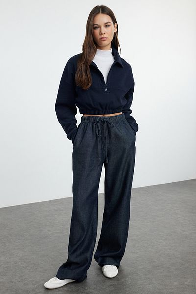 Trendyol Collection Преміум темно-сині 100% TencelTM еластичні джинси з високою талією та широкими штанинами TWOAW25JE00046