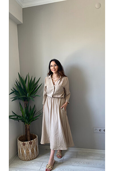 Butik BELİ LASTİKLİ DÜĞMELİ ELBİSE