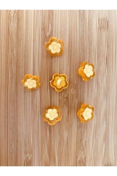 Öztürk Transparent plastic daisy baby button with bottom sewing. 1.5cm. 6 pack.