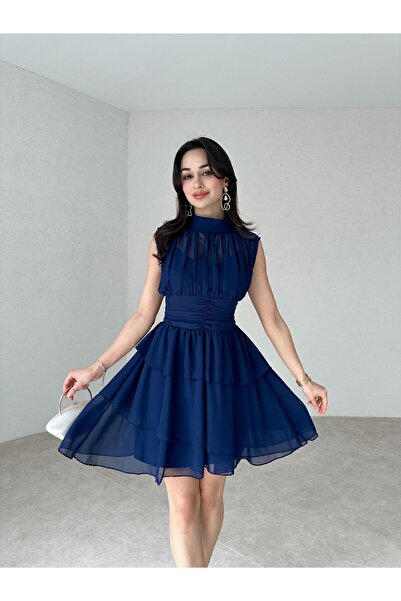 Genel Markalar Massimo Model Drapeli,dik Yaka,kolsuz,mini,fermuar Kapamalı,şifon,etek Çapraz Kesim Detaylı Elbise