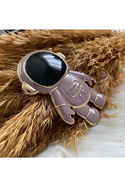 Aksesuarda Moda حامل رائد فضاء لطيف على سطح الطاولة