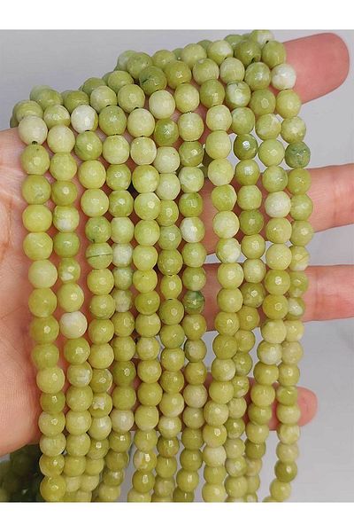 Yasamtohumu Piatra de peridot tăiată cu fațete verde-alb - 9 cm lungime (45950)