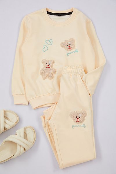 TRENDYOLKIDS Krémszínű mackó mintás kötött pizsama szett lányoknak - Tkdaw25au00077