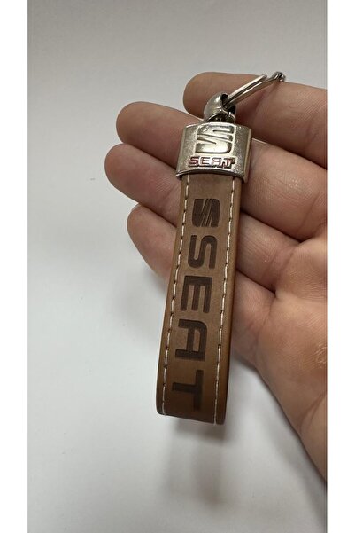 imza direksiyon kılıfı سلسلة مفاتيح مكتوبة وشعار (بني) من الجلد الحراري