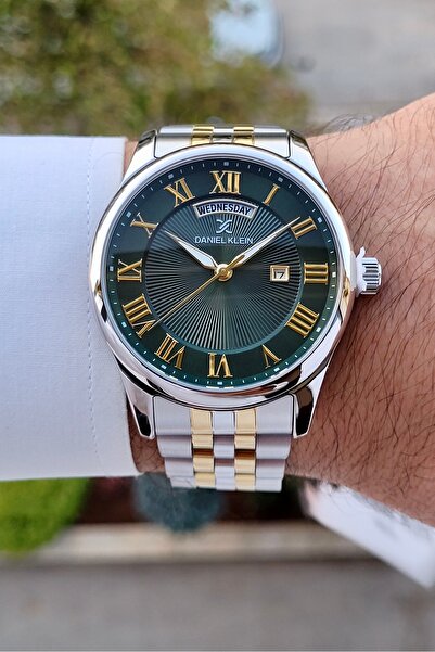 Daniel Klein Kadranı Yeşil Kordonu Altın Metalik Renk Takvimli 2 Yıl Garantil...