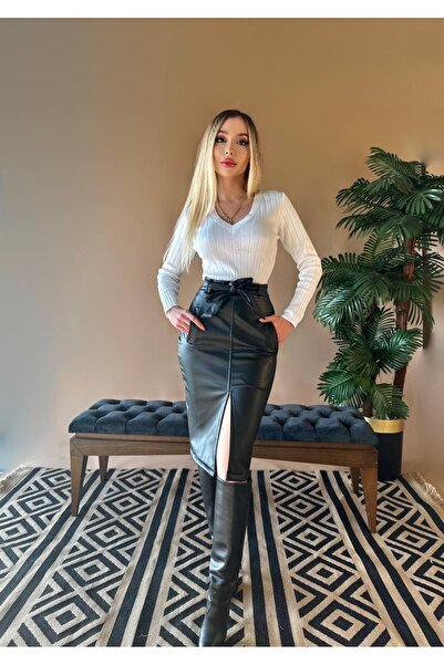 NEW STATION تنورة جلدية جديدة