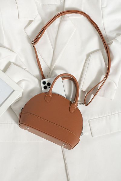ESTUTE D model mini bottle crossbody box