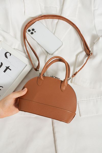 ESTUTE D model mini bottle crossbody box