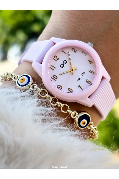 Q&Q Pink Silicone Corded 10 Bar Waterproof Girl's Wristwatch - Pool and Sea Use