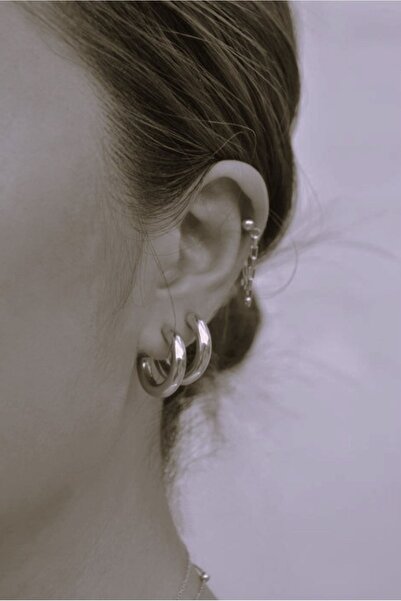 Mu Minamu 316 L Steel Curved Hoop Earrings