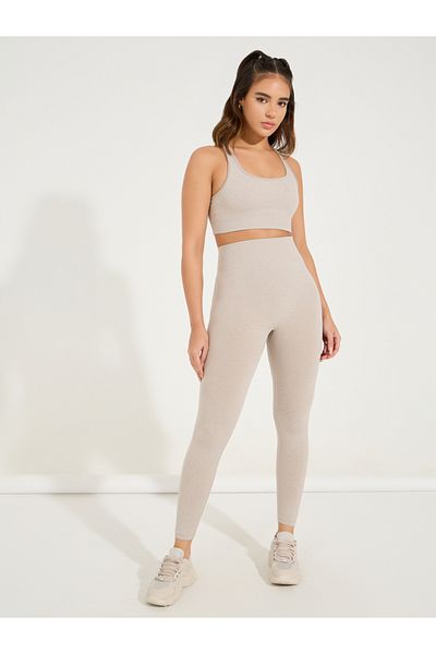 Styli طقم حمالة صدر رياضية وبنطال ضيق بتصميم Racerback من Melange