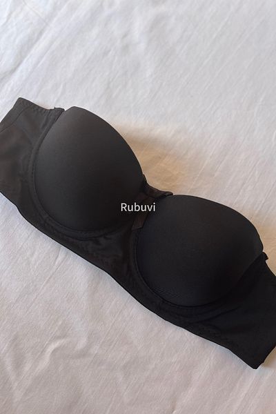 Rubuvi Μαύρο γυναικείο σουτιέν στράπλες - Καπάκι B, χωρίς υποστήριξη και κάτω σύρμα