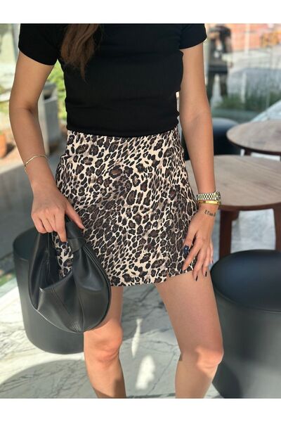 madamedoyou تنورة قصيرة منقوشة بنقشة الفهد