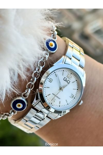 Q&Q Retro Brand Silver Colored Steel Cord Women's Wrist Watch and Evil Eye Beaded Bracelet