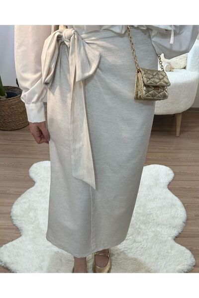 Butik تنورة نسائية بيج - تصميم مربوط