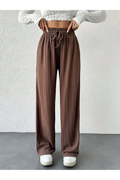 OLSAMODA KADIN DOKULU KUMAŞ RAHAT KESİM BELİ LASTİKLİ CEPLİ SALAŞ PANTOLON