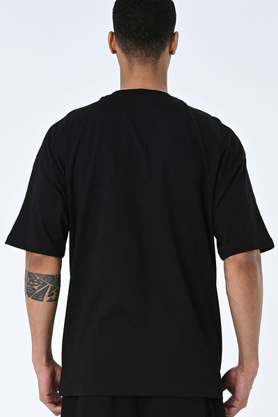 AMAZING CRASH Μαύρο μπλουζάκι Unisex με στάμπα με λαιμόκοψη Oversize