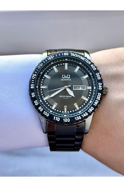 Q&Q Men's Black Tachometer Frame Date and Day Display Sports Analog Watch