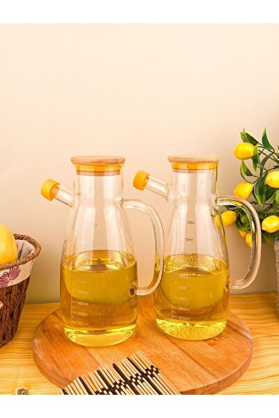 Akkoyunlu home مجموعة من 2 أواني زيت زجاجية بيضاوية من البوروسيليكات مع غطاء ...