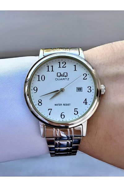 Q&Q Men's Thin Elegant Bezel Date Dial Gold Line Cord Analog Watch