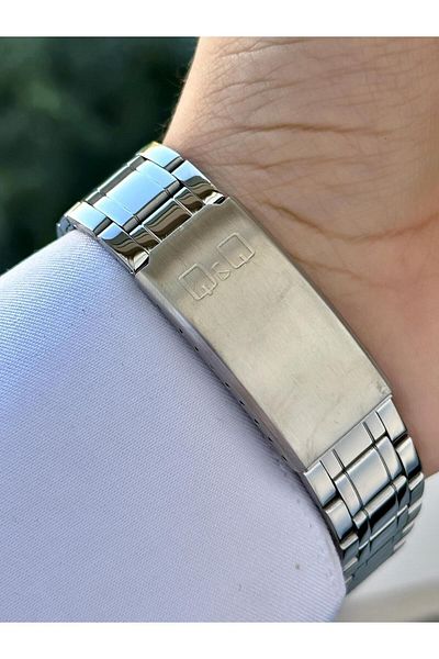 Q&Q Men's Thin Elegant Bezel Date Dial Metal Cord Analog Watch