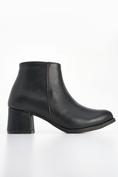 Marjin Dámské kozačky na podpatku se špičatým zipem na silném podpatku Tekaz Black