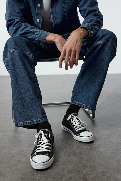 TRENDYOL SHOES Pánská sportovní obuv – černá, šněrovací, plochá TAKAW25SN00011