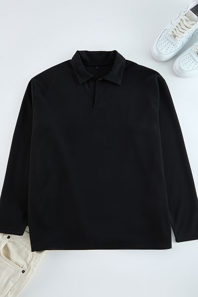 Trendyol Collection Übergroßes schwarzes Poloshirt mit Rundhalsausschnitt - Tmnaw25po00001