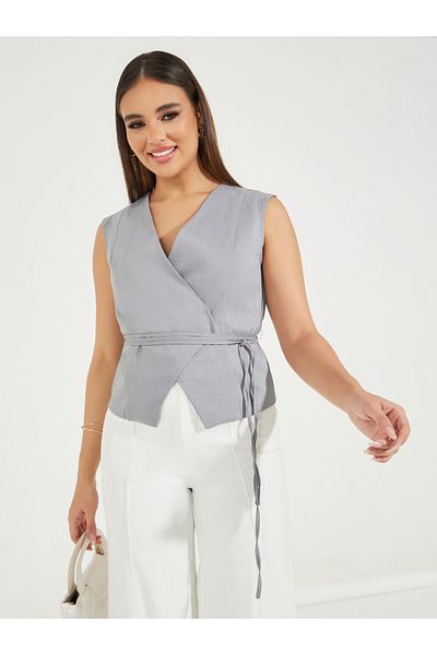Styli Solid Sleeveless Wrap Top with Waist Tie Detail