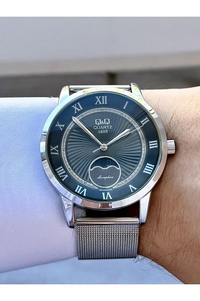Q&Q Men's Dark Blue Moving Detail Dial Silver Mesh Cord Analog Watch