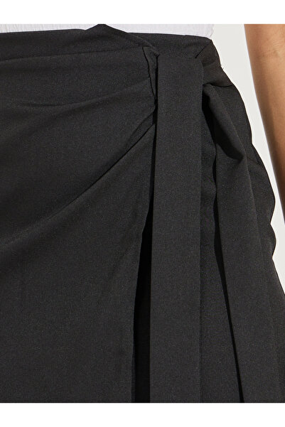 Styli Solid Side Wrap Detail Knee Length Skirt