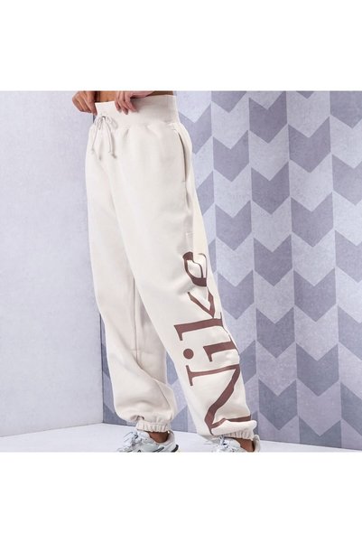 Nike Sportswear Phoenix Fleece Oversized Logo Graphic Kadın Eşofman Altı fn25...