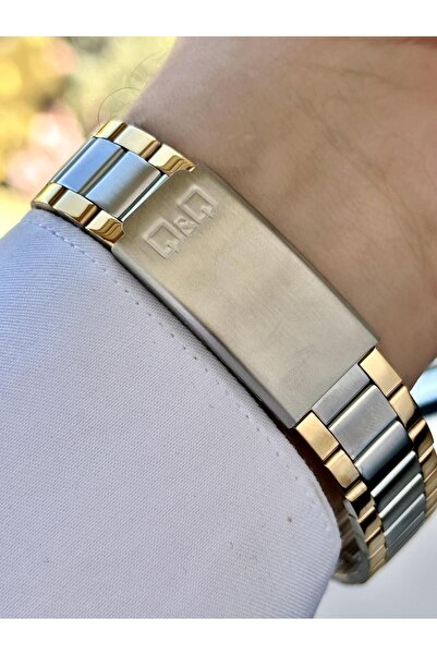 Q&Q Men's Silver Gold Thin Bezel Numeral-Free Plain Striped White Dial Analog Watch