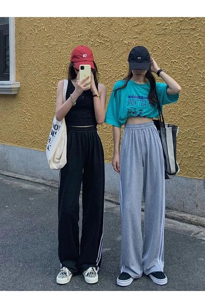 Karatopak Pantaloni de trening pentru femei gri-negru - dungi duble, picior lat