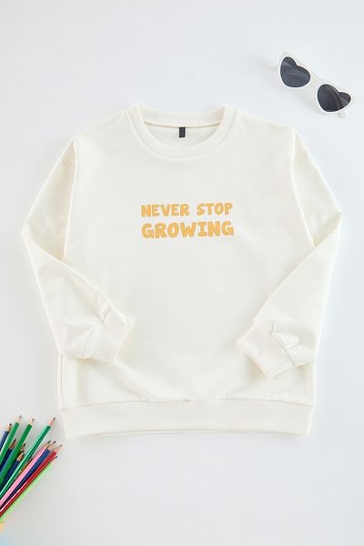 TRENDYOLKIDS Chlapecká ecru pletená mikina - Slogan Print, Tkdaw25Sw00046