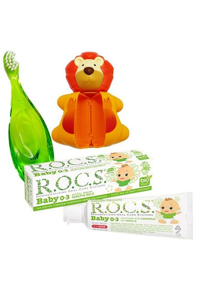 R.O.C.S. معجون أسنان للأطفال بعمر 0-3 سنوات - مستخلص البابونج، 35 مل + فرشاة أسنان روكس وحاوية تخزين