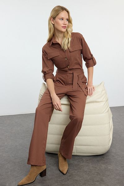 Trendyol Collection Μακριά καφέ ολόσωμη φόρμα - ζωσμένη και λεπτομερής τσέπη Twoaw25tu00006